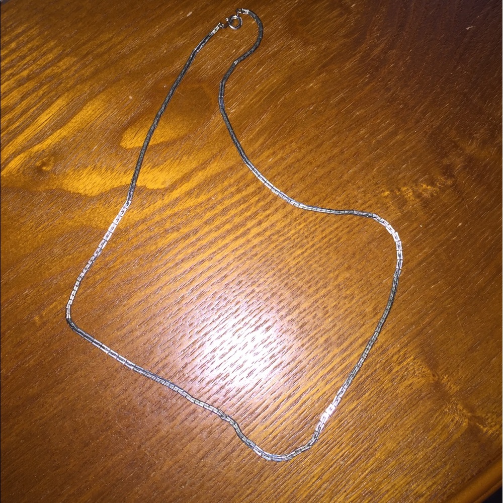 Silver chain necklace.